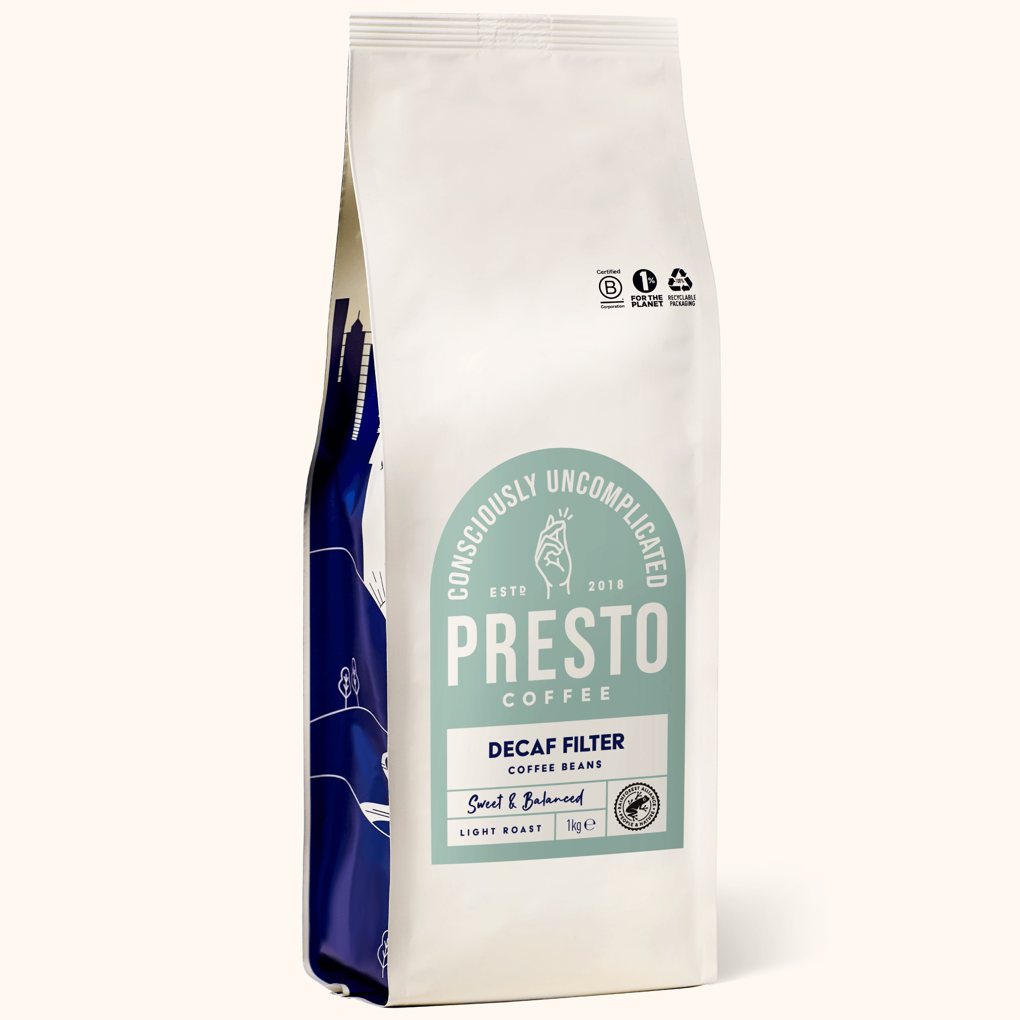 Presto Coffee decaf filter coffee beans, 1kg bag, consciously uncomplicated, sweet and balanced, light roast, certified B Corporation, recyclable packaging.