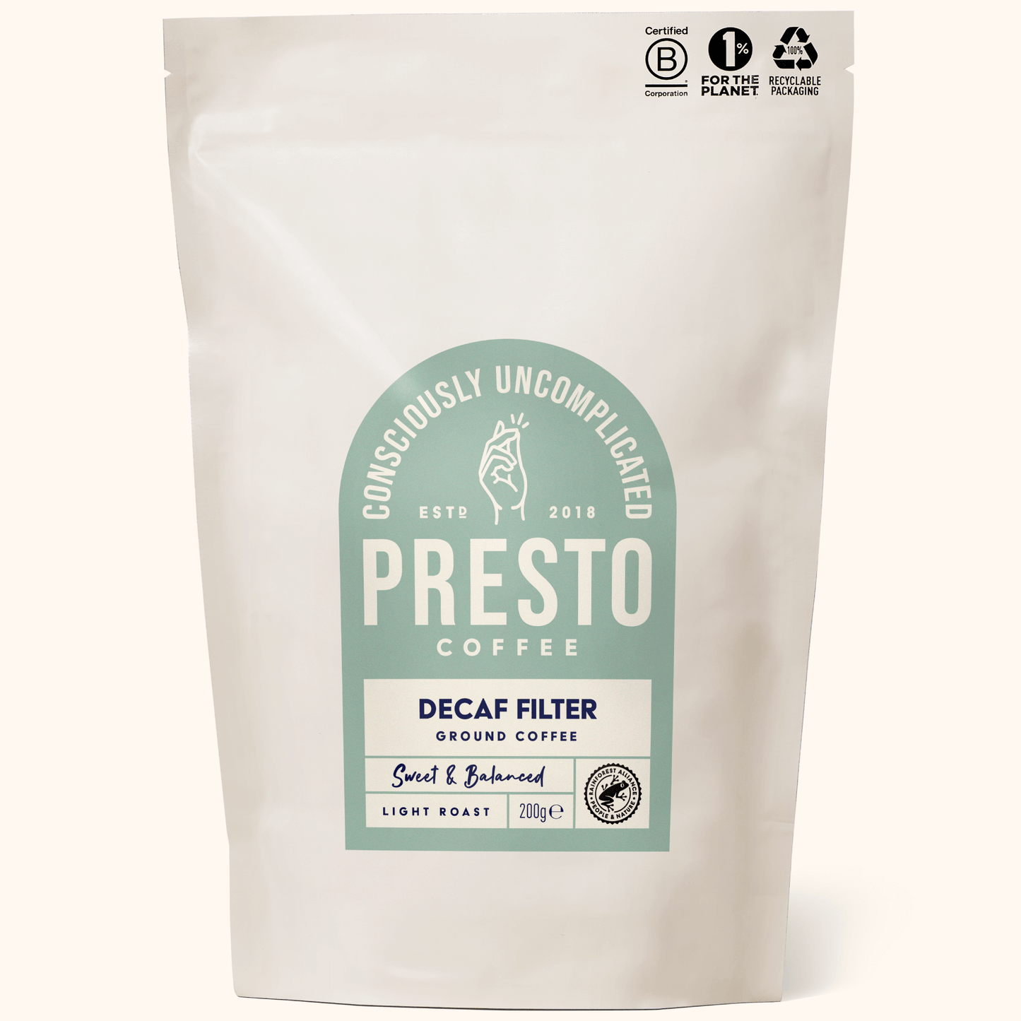 Presto Coffee Decaf Filter Ground Coffee packaging with certifications, light roast, 200g, consciously uncomplicated branding.