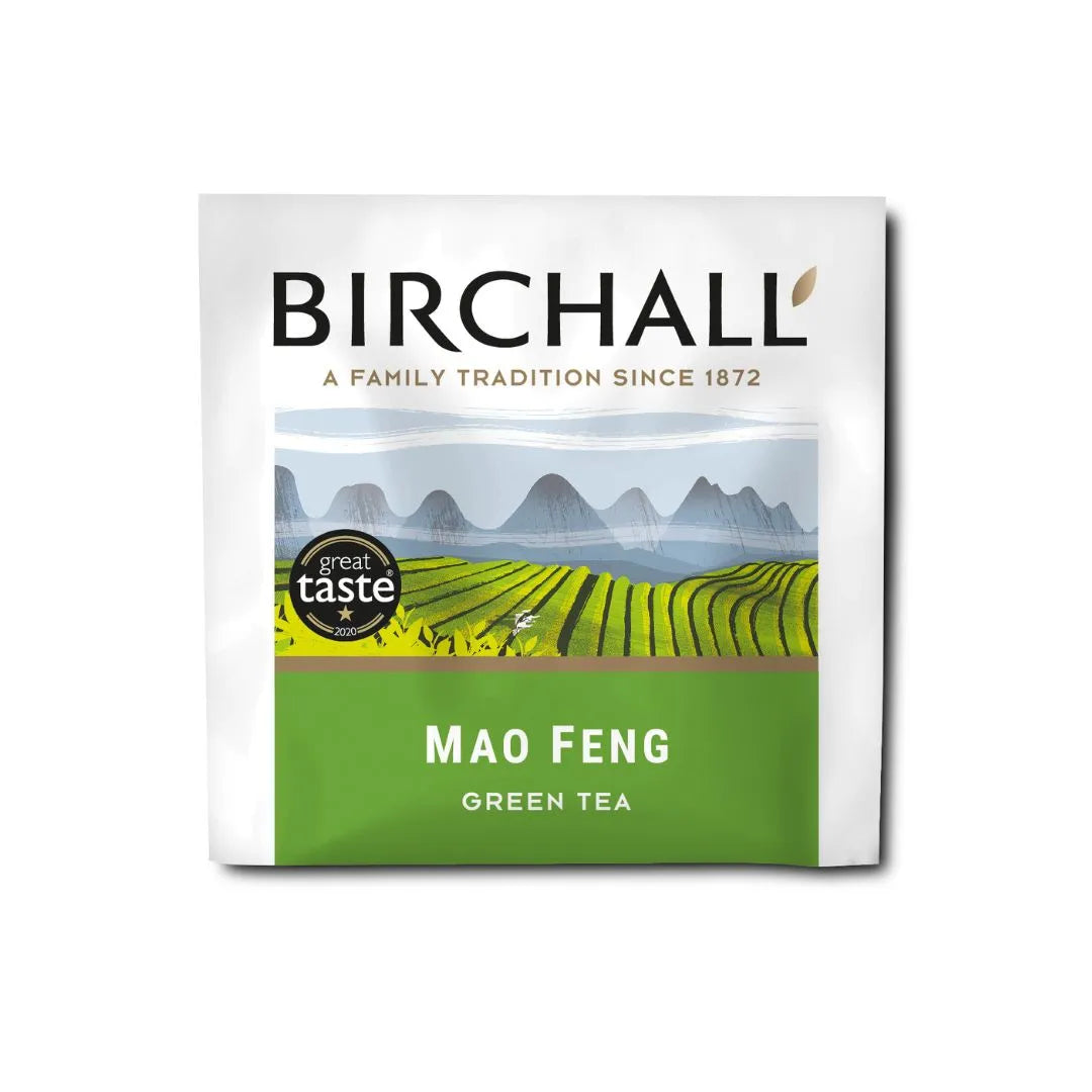 Birchall Mao Feng green tea packaging, showcasing a landscape illustration of tea fields and mountains, labeled with "Great Taste 2020" award.