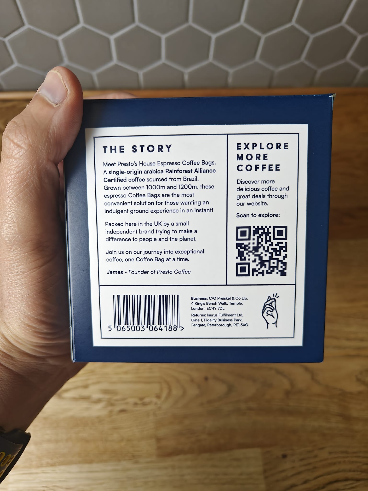 Back of Presto Coffee packaging featuring story details, single-origin Arabica coffee from Brazil, Rainforest Alliance Certified, QR code for more coffee exploration, and barcode.